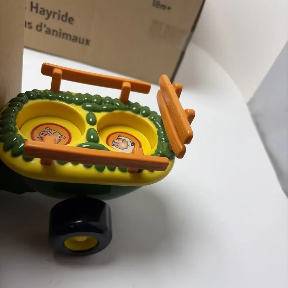 TOMY John Deere Animal Sounds Hayride Musical Tractor Toy